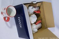 Six ceramic mugs with Bing Cherries pattern in original cardboard box with tissue paper for protection.