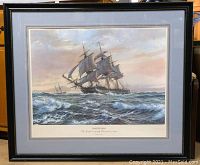 Full view of the framed print showing the USS Constitution sailing in the ocean with a cloudy sky.