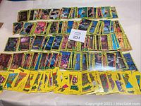Multiple rows of Teenage Mutant Ninja Turtle collectible cards in yellow borders, displayed fanned out on a surface.