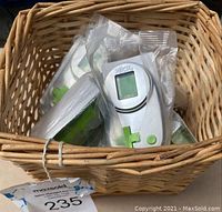 Basket of five Xbox handheld electronic games in original plastic packaging