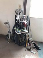 Full view of golf bag on Turf Rider cart with clubs