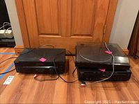 Photo showing three audio equipment pieces on floor including Sony STR-DE135 receiver, Denon DP-23F turntable with dust cover, and KLH DA1602 receiver