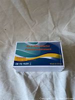 Photo of the closed product box labeled Air Quality Detector Precision Instrument with certification logos.