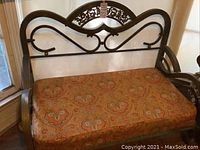 Front view of bench showing full frame and cushion