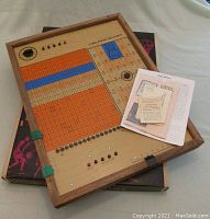 Vintage wooden game board for "Computer Basketball" by Electronic Data Controls Corp., from 1969 with original box and paperwork on top.
