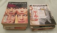 Two stacks of vintage Esquire magazines showing cover images and spines