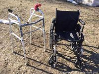 Drive Cruiser III wheelchair next to metal walker outdoors