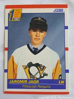 Front image of 1990-91 Score Jaromir Jagr rookie card showing player portrait in Penguins jersey with draft status.