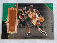 Front of the 1998 Michael Jordan Upper Deck SPX Finite basketball card showing action shot of Michael Jordan in Bulls uniform with foil emblem and numbering.