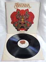 Vinyl record outside sleeve showing label and surface