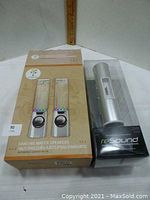 Brand new boxed dancing water speakers with colored jets and silver base. Box shows brand Gadgetree.