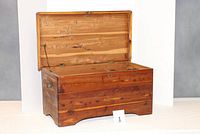 Open view of cedar chest showing interior and left side drop lid support