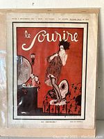 Full view of the antique French magazine cover titled 'le Sourire' from December 1921, showing the complete central illustration and printed text.