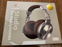 Boxed OneOdio Studio DJ Headphones Pro-30 with branded packaging showing product image and 24-month warranty badge.
