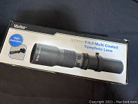 Boxed Vivitar 500mm F/8 Multi-coated Telephoto Lens showing branding and specifications.