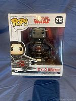 Front view of Funko Pop Star Wars Kylo Ren with TIE Fighter #215 in original box