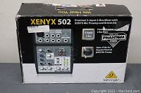 Front and top of Behringer Xenyx 502 original box showing product image and specifications.