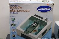 Picture of Dr Scholl's Pedicure Foot Spa box showing product image, features and brand.