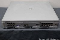 Front view of Samsung OfficeServ 7100 unit showing multiple Ethernet ports and Samsung branding.