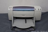 Front view of the Hewlett Packard DeskJet 950C printer showing the tray and general unit condition.