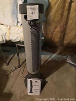 Front full view of ultra slim tower fan with control panel on top and base visible