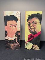 Front view of Diego Rivera and Frida Kahlo decorated boxes showing artist portraits on each box front.