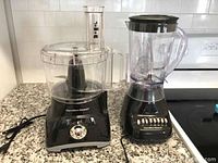 Photo showing both Hamilton Beach blender and 3.5 cup food processor side by side on granite countertop in kitchen.