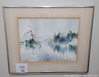 Full view of framed watercolor in silver frame and beige mat
