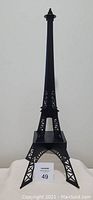 Front view of black powder-coated metal Eiffel Tower sculpture, showing its full 24" height and base.