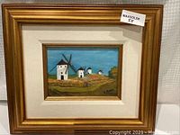 Framed oil painting showing the full artwork and frame from a front angle.