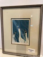 Framed print showing the full view of the artwork with beige mat and wood frame.