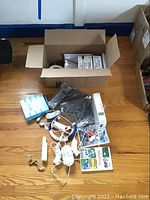 Overall lot contents on hardwood floor