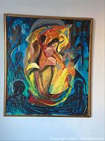 Overall view of framed abstract painting on wall