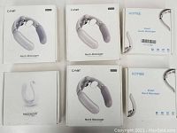 Six neck massager boxes arranged in two rows of three, showing CHOT, HOMIEE and generic packaging