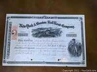 Full view of the stock certificate showing the farmer with a scythe vignette, certificate number 497, and printed text.