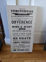 Front view of the canvas wall art showing the full text 'Be an Individual' with various inspirational phrases in black text on white background.