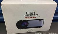 Box labeled 'High Definition Projector' to show original packaging.