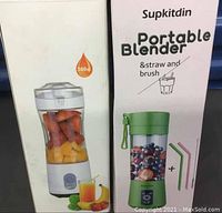 Box image showing Supkitdin Portable Blender with straw and brush, 380ml capacity