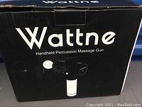 Box of Wattne Handheld Percussion Massage Gun showing the brand and product type on the front.