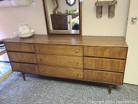 Front view of dresser with mirror