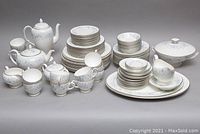 Full overview of entire Wedgwood Belle Fleur china layout including plates, bowls, cups, saucers and serving pieces.