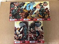 Full set of five 'What If? Age of Ultron' comics laid out on a flat surface, showing front covers.