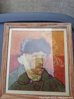 Frontal view of Van Gogh self-portrait print in wood frame, showing the artwork and frame condition.
