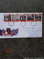 Front view of white first day cover envelope with five attached 25p stamps commemorating British D-Day 50th anniversary, postmarked June 6, 1994, addressed to Canada.