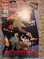 Front color cover of Cheap Trick comic book with illustrated band members and promotional notes