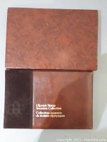 Brown textured protective outer box for the Olympic Stamp Souvenir Collection.