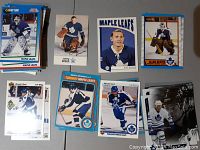 Multiple Toronto Maple Leafs hockey cards with various players shown, some duplicates included.