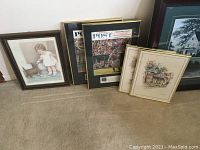Four framed prints including a girl with a dog, two architectural house prints, and two Norman Rockwell magazine covers with scenes of people.