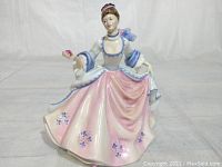 Front view of figurine on plain background