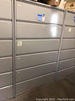 Front view of the six drawer lateral file cabinet showing all drawers closed.